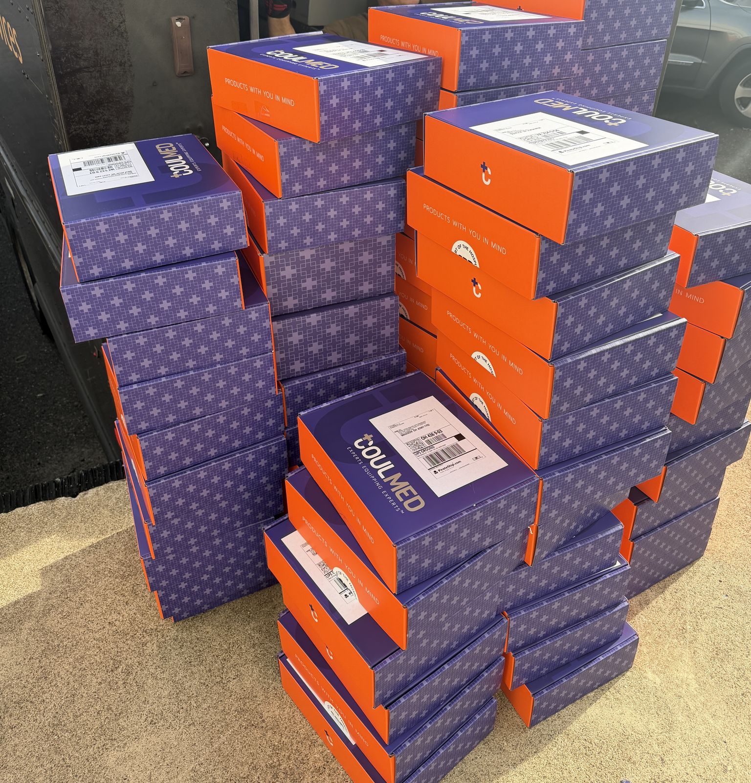 Pile of labeled boxes ready for UPS pickup